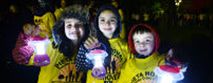 Kids taking part in darkness into light
