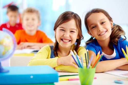 Children smiling in school
