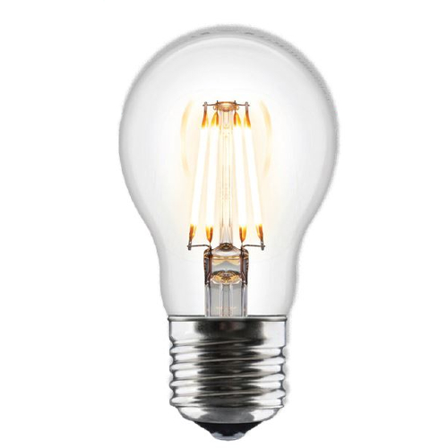 Classic incandescent light bulb glowing brightly.